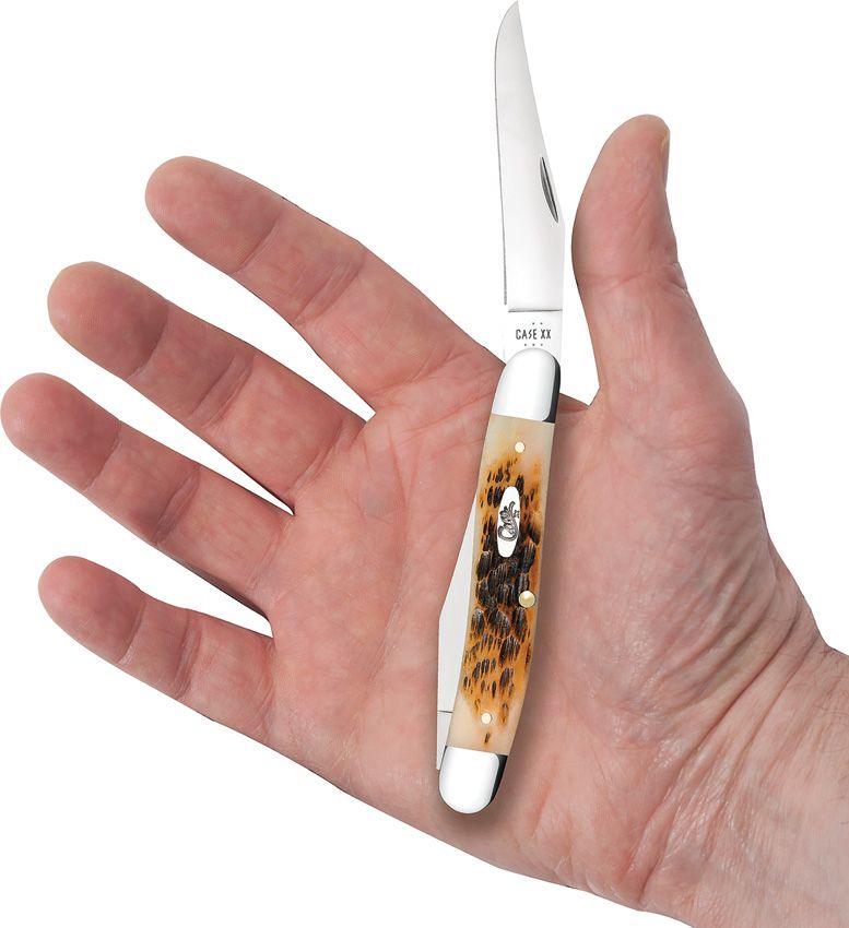Case XX Muskrat – Amber Peach Seed Jigged Bone | Model 10798